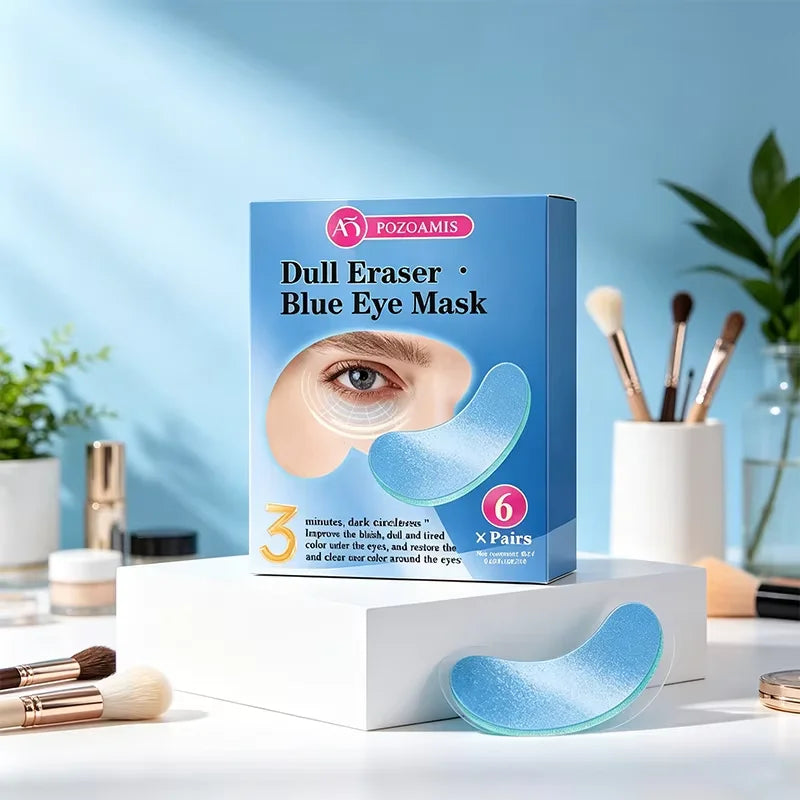 Box of Dull Eraser Blue Eye Mask with 6 pairs shown next to a white box and makeup brushes