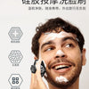 A man is using a white silicone facial cleaning brush on his face for deep scrubbing.