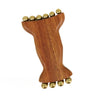 A natural wood facial and scalp massage comb with small metal balls on the top and bottom.