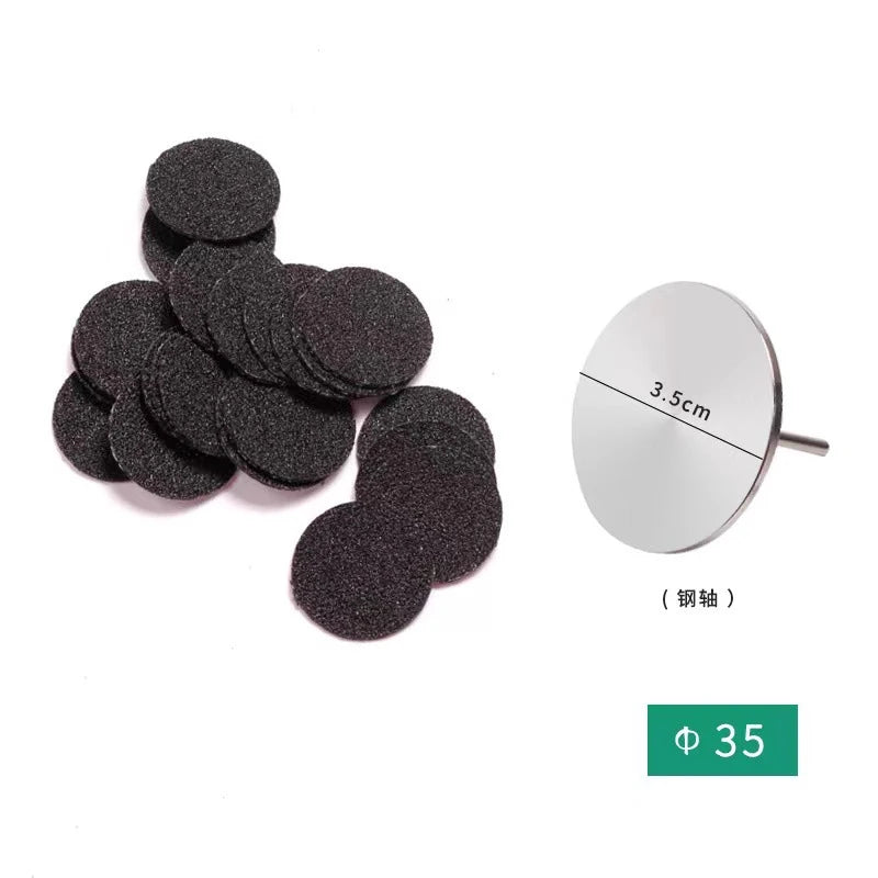 Pile de disques de ponçage noirs remplaçables avec une échelle de mesure indiquant 3,5 cm.