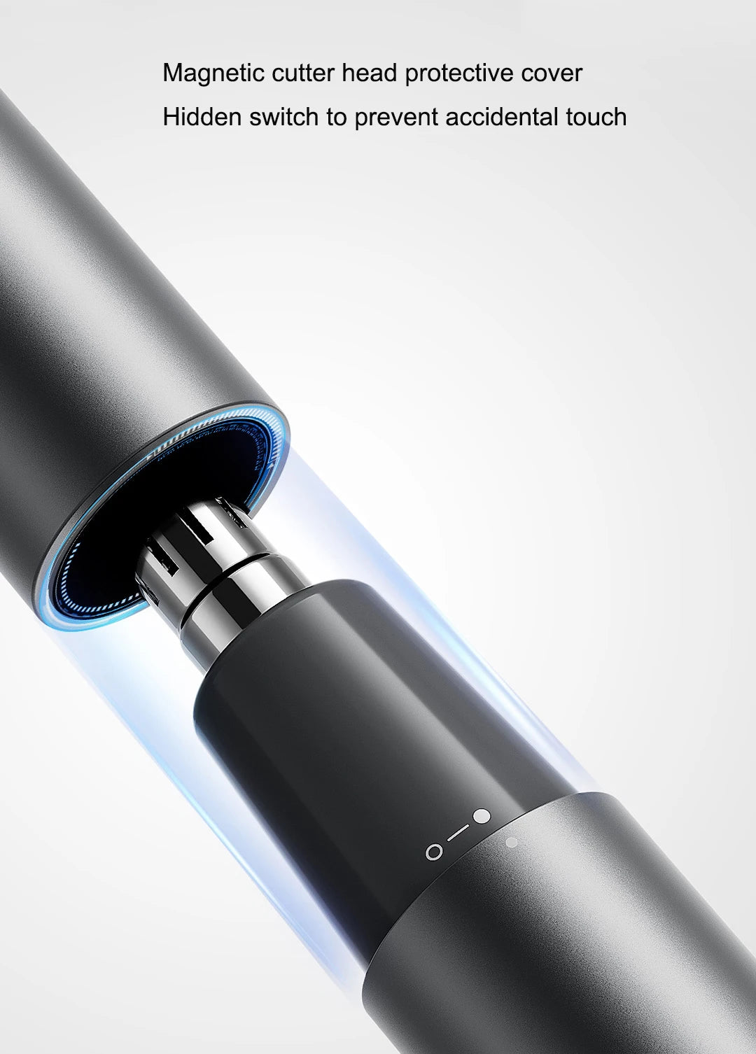 Close-up of a black electric hair trimmer with a magnetic cutter head protective cover and a hidden switch.