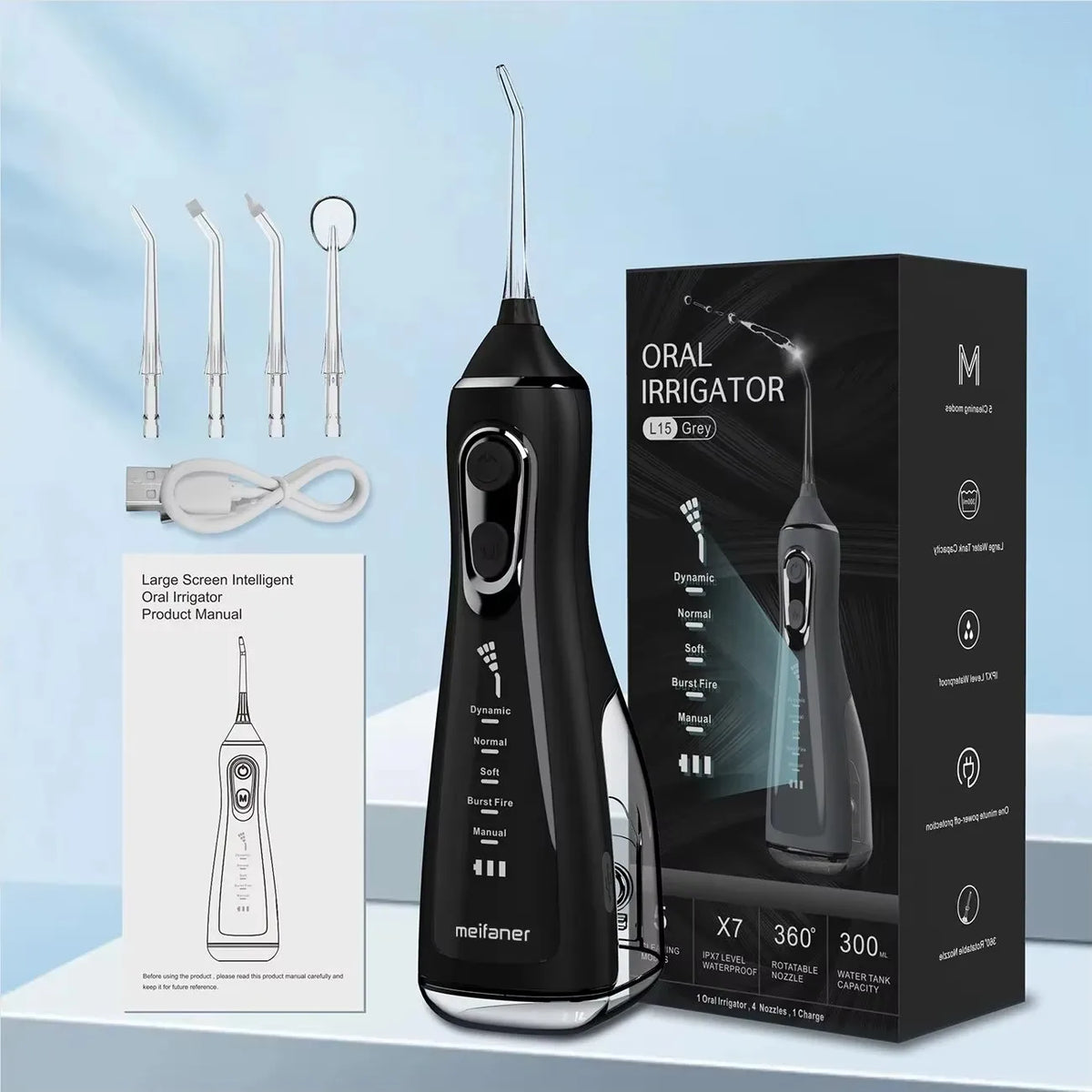 A black portable oral irrigator device with a clear nozzle and charging cable is displayed next to its packaging.