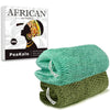 A green exfoliating loofah sponge is shown next to its packaging featuring an African-inspired design.