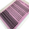 A display of black eyelash extensions, including bottom lashes and wispy spikes, arranged in rows.