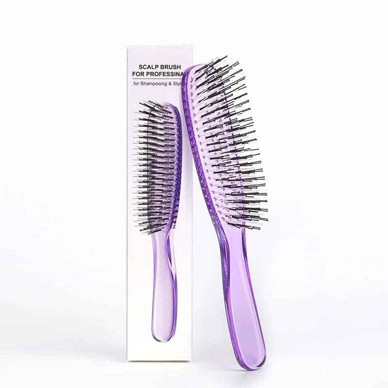 A purple scalp brush for professional use is shown next to its packaging.