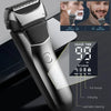 A close-up view of a professional electric shaver for men in silver and black, showing usage modes and features.