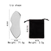 A black pouch containing a stainless steel Gua Sha massager tool with a lip shape for facial and body scraping.