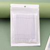 A package of bulk eyelash extension cleaning swabs in white.