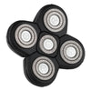 A black precision electric razor head with multiple rotating blades visible from above.
