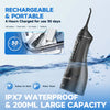 A black rechargeable water flosser with a long neck is shown in a splash of water.