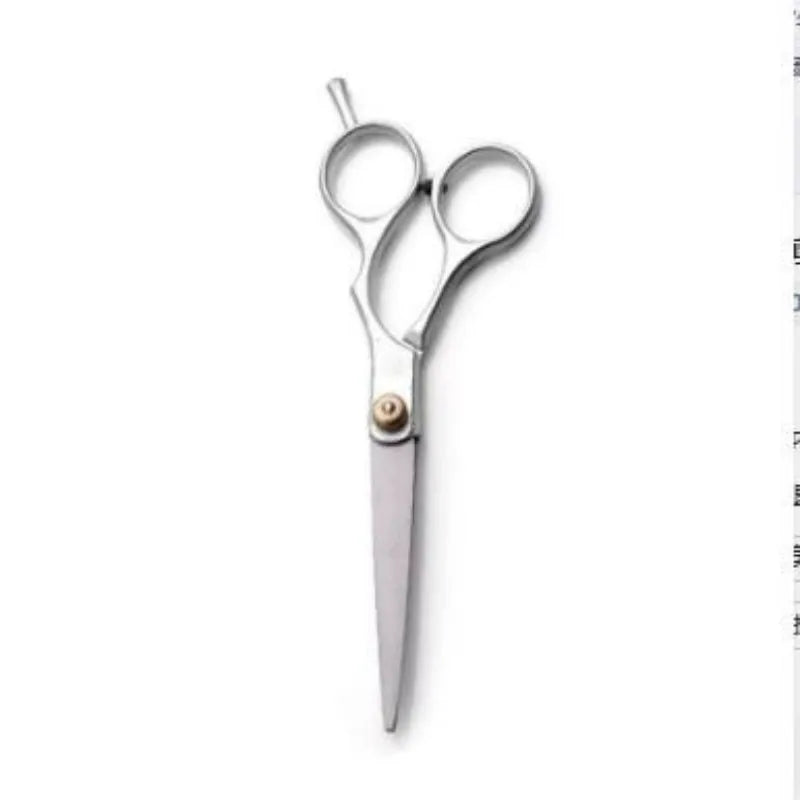 A pair of professional barber scissors and thinning shears set with silver blades.