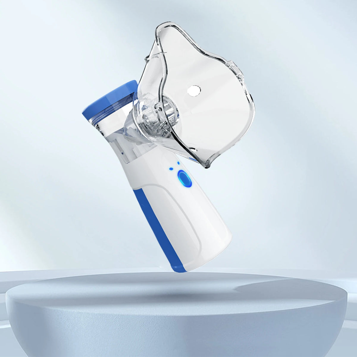 A white and blue 2-in-1 facial steamer and humidifier device is shown from the side against a light gray background.