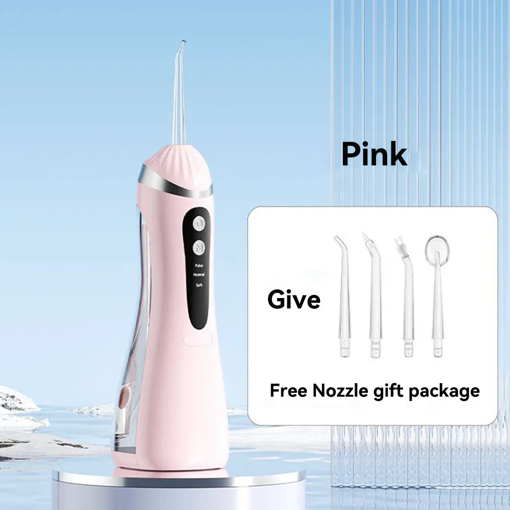 Pink professional rechargeable oral irrigator with multiple nozzles shown on a stand