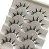 A set of anime-inspired dramatic false eyelashes displayed on a white plastic tray.
