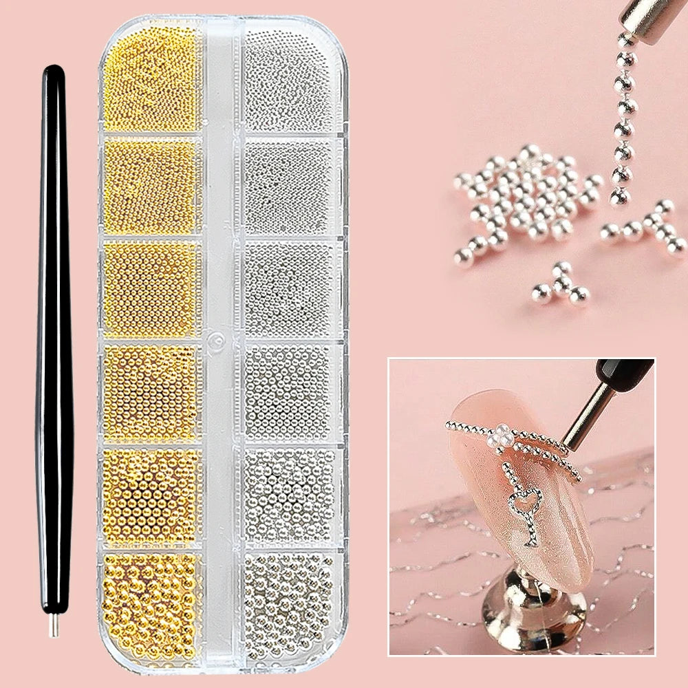 A clear plastic case holds various gold and silver stainless steel bead nail art decorations, with some beads scattered nearb