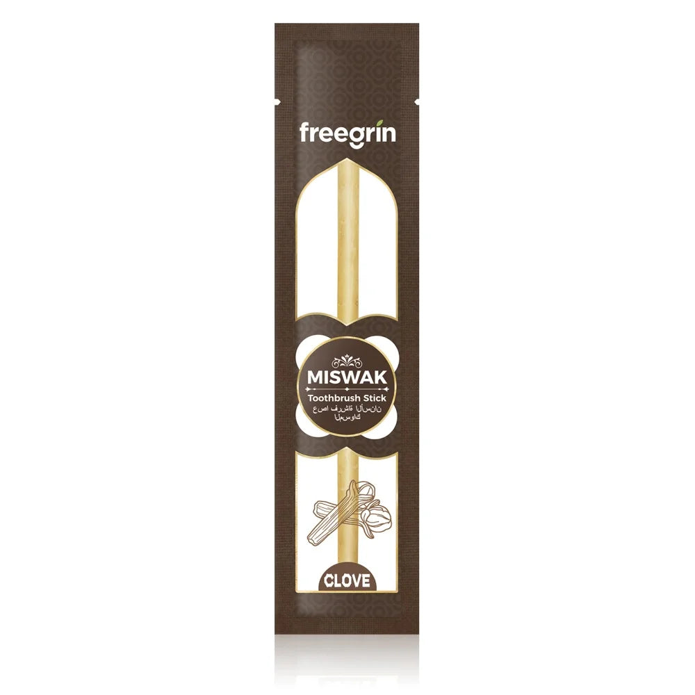 A vertical package of Miswak toothbrush sticks in a brown cardboard box.