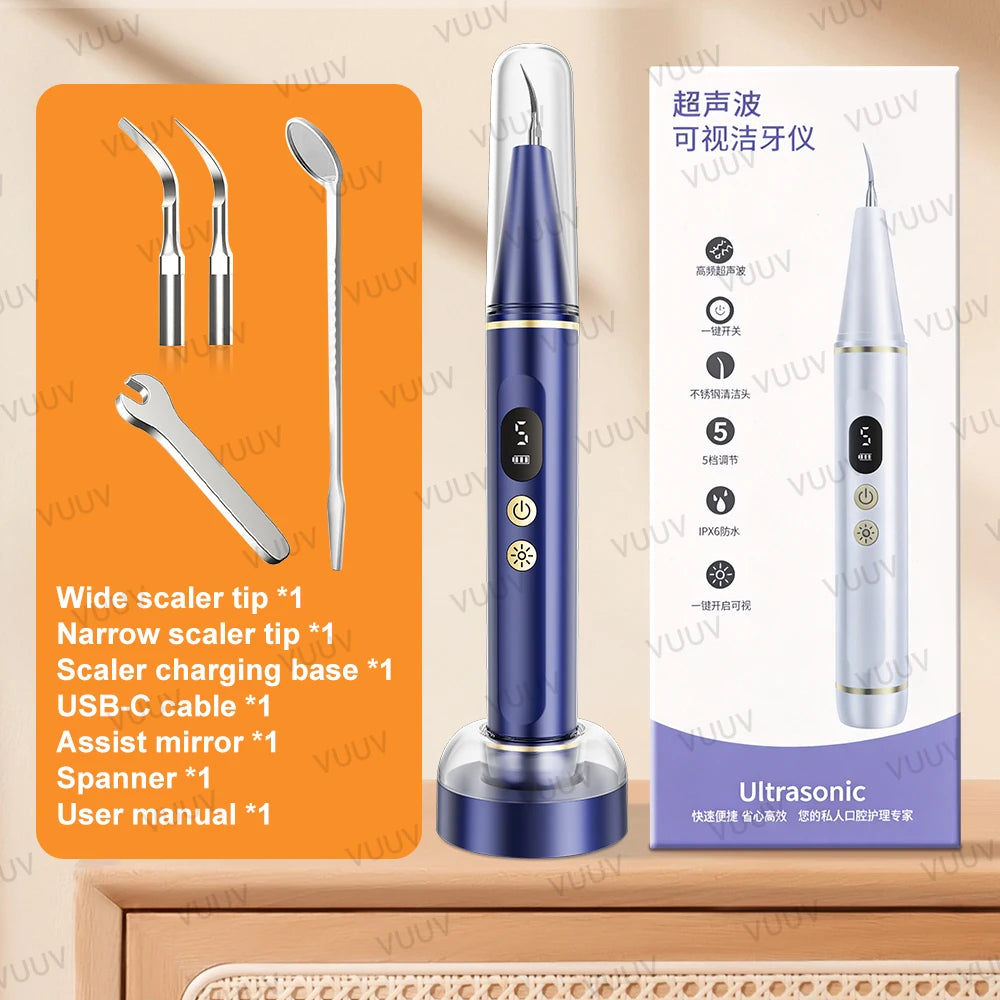 A set of ultrasonic dental scalers and accessories including tips, a charging base, and an instruction manual.