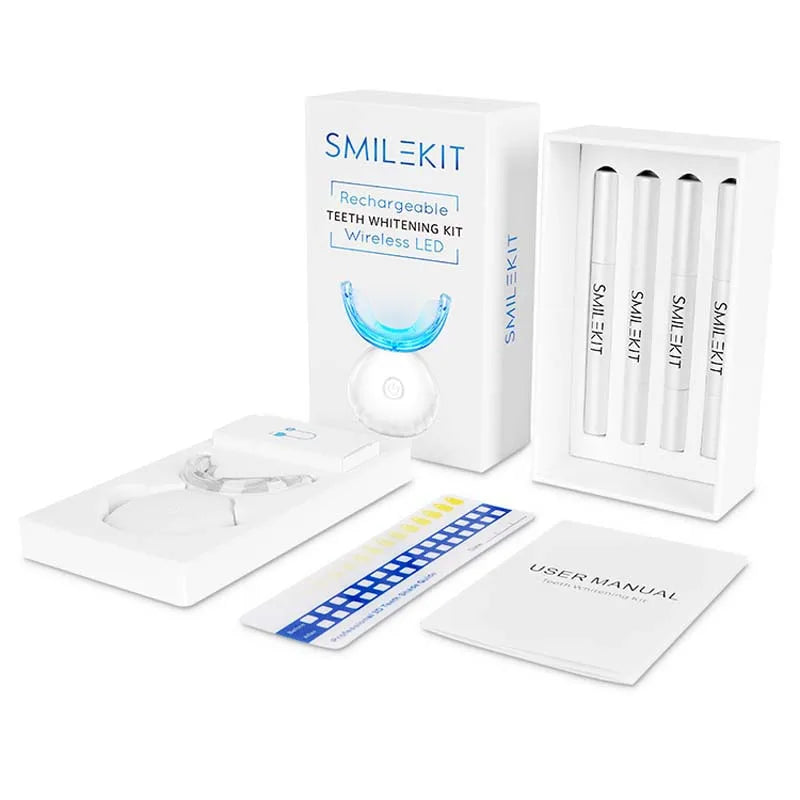 A white box containing a rechargeable teeth whitening kit with several tubes and a user manual.