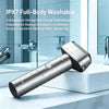 A close-up of a professional reciprocating electric shaver with a silver finish resting on a white marble surface.