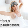 A woman wearing a gray 3D memory foam sleep mask is lying in bed, looking refreshed.