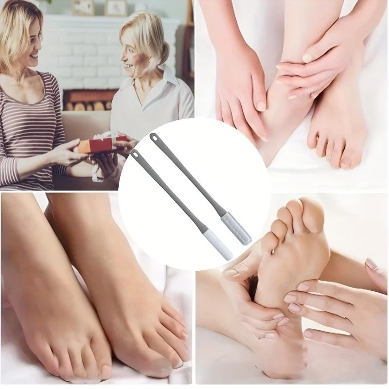 Hands gently scrubbing and massaging feet with a long-handled manual foot scrubber for cleaning