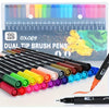 A set of 12 dual-tip brush pens in various vibrant colors laid out on a white surface.