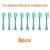 Eight replacement brush heads for an Ocean electric toothbrush, shown lined up.
