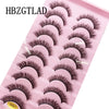 Un plateau en plastique rose contenant divers styles d'extensions de cils faux de renard.