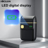 A black portable electric shaver with a gold accent and an LED digital display showing a green battery icon.