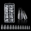 A collection of frosted French false nails in various natural finishes displayed in a clear plastic case and loose.