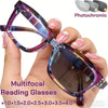 A hand holds a pair of photochromic multifocal reading glasses with purple and pink lenses.