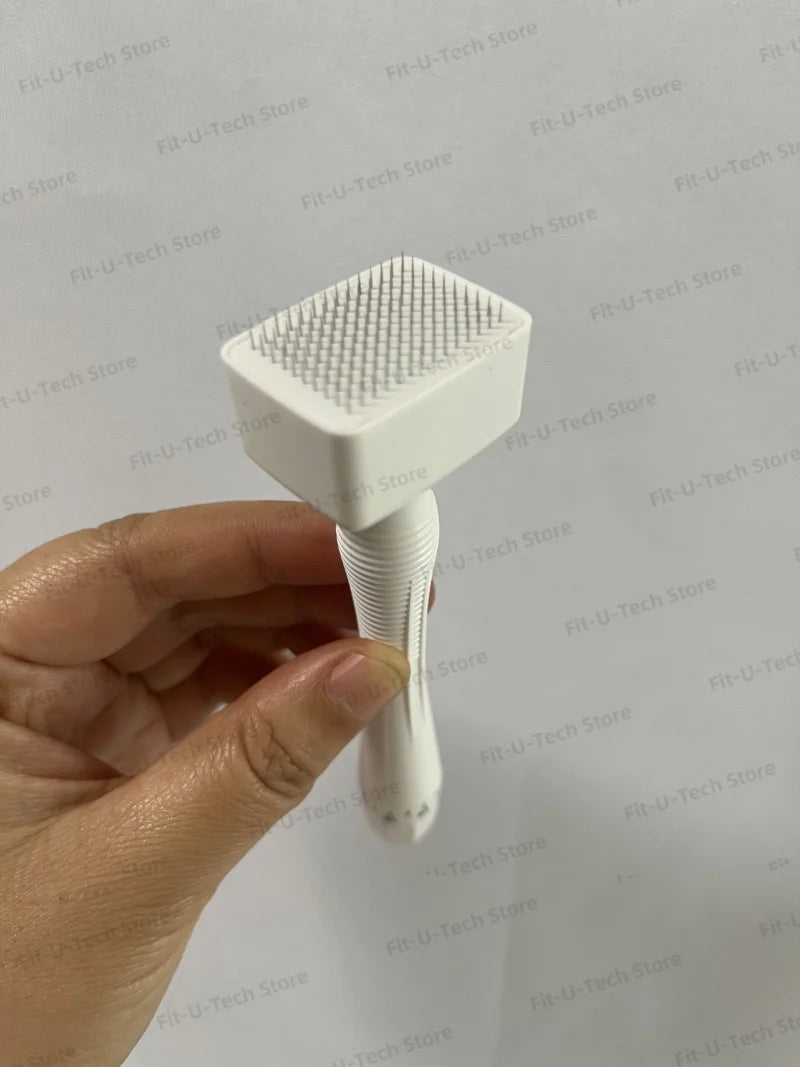 A hand holds a white adjustable microneedling derma stamp device with a textured head.