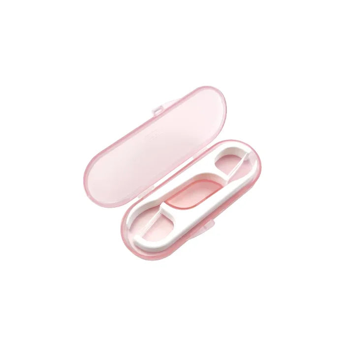 A pink portable teeth flosser cleaning stick set with an open lid.