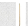 A set of Y2K almond press-on nails including a pink nail and a wooden cuticle pusher.