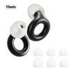A set of ten black and white silicone earplugs for noise reduction
