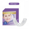 Box of orthodontic braces for kids and a clear silicone dental alignment trainer
