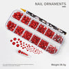 Kit de plástico transparente con adornos de uñas de diamante rojo brillante y diamantes sueltos rojos.