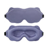 A pair of purple 3D sleeping eye masks shown from the front.