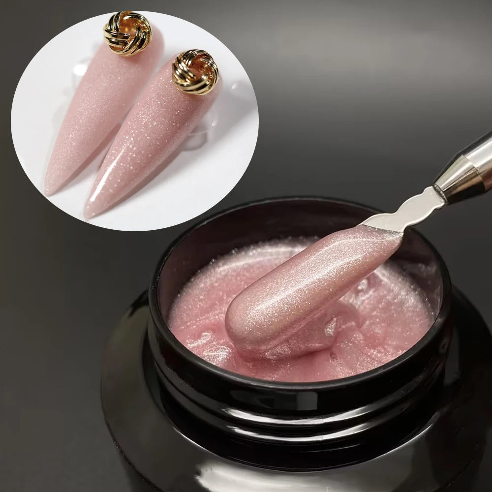 Un outil cosmétique montrant un constructeur en gel rose pailleté moyen pour extensions de ongles dans un contenant en verre 