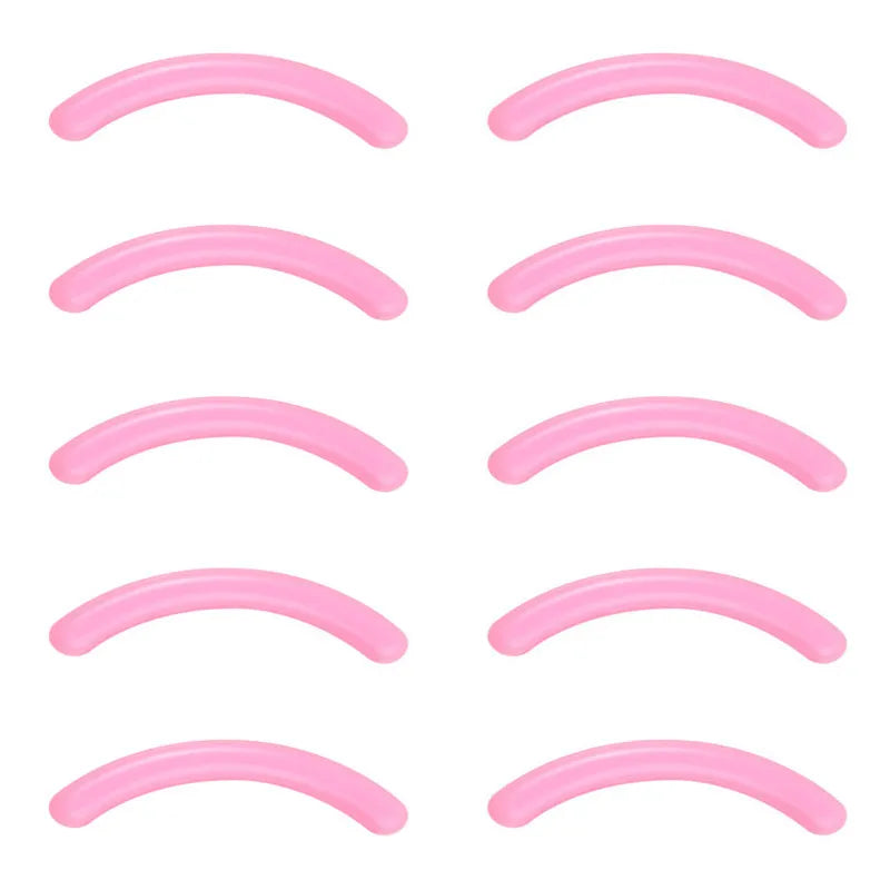 A set of pink professional eyelash curlers shown in various curved shapes.