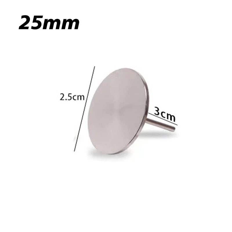Disque de ponçage rond en argent, diamètre 25mm et tige de 3cm, à côté d'une règle.