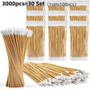 A bundle of 3000 wooden cotton swabs packaged in sets, showing individual swabs and bulk quantity.