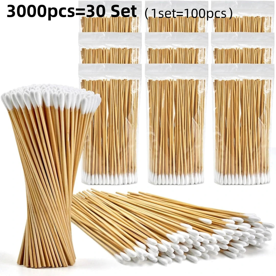A bundle of 3000 wooden cotton swabs packaged in sets, showing individual swabs and bulk quantity.