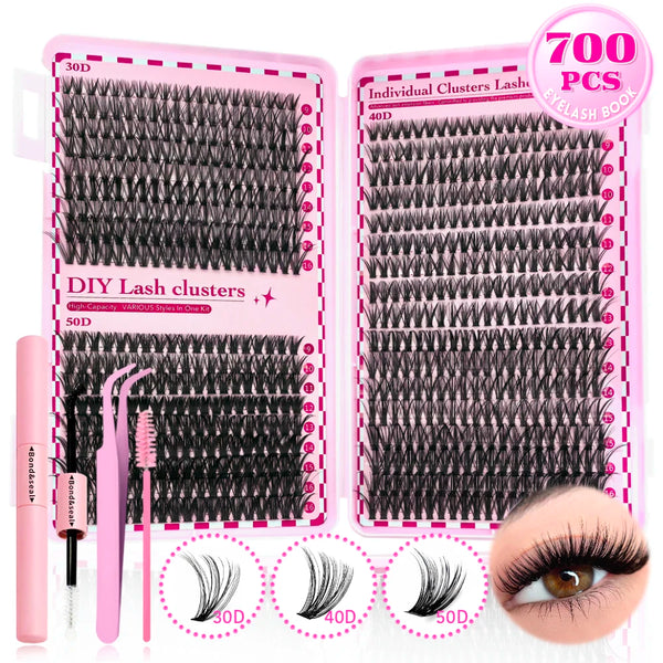 A pink box containing 700 individual clusters of mixed length black eyelash extensions and tools for DIY lash clusters