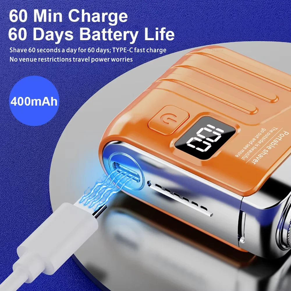 An orange portable electric shaver is shown being charged by a white USB cable.