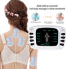 A woman is receiving full body massage using a white anti-microcurrent device on her back and neck.