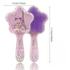 Un set de deux peignes à cheveux en carton d'animaux violets et roses pour enfants et adultes.