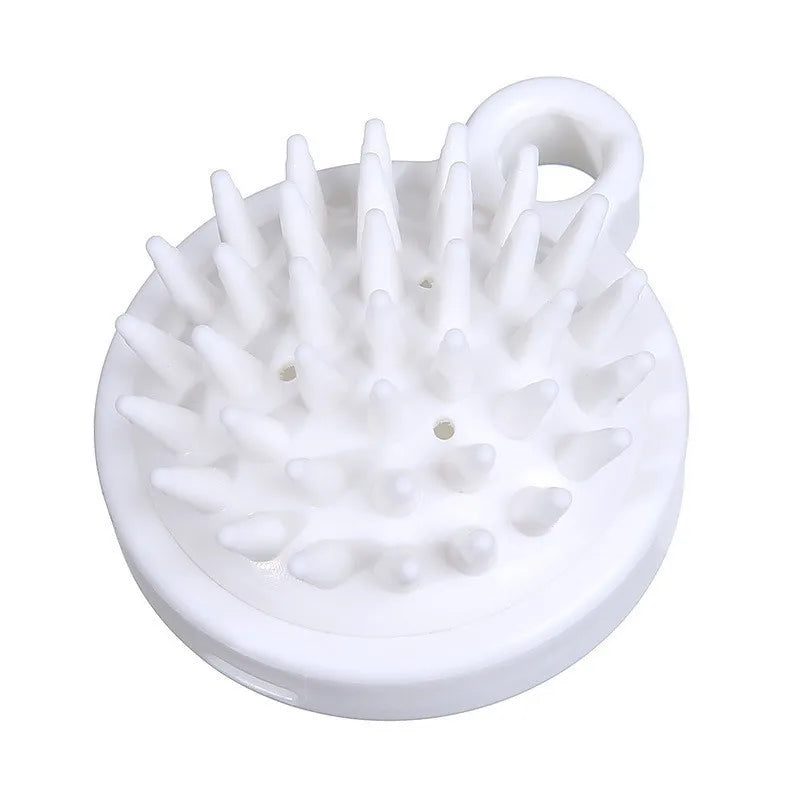 White silicone scalp massage and body brush with multiple bristles