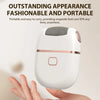 A white electric foot grinder with a gray head is held by a person against a light background.