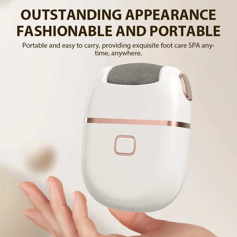 A white electric foot grinder with a gray head is held by a person against a light background.